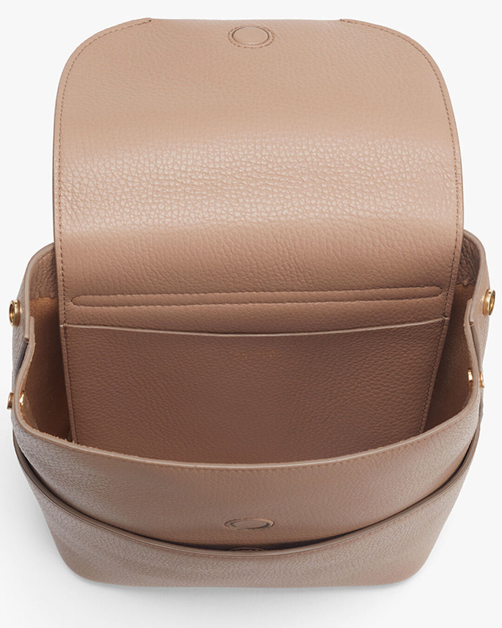 Mini Leather Backpack Textured shoulder bag with flap closure and adjustable strap.
