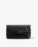 Handbag with a knotted design and chain strap