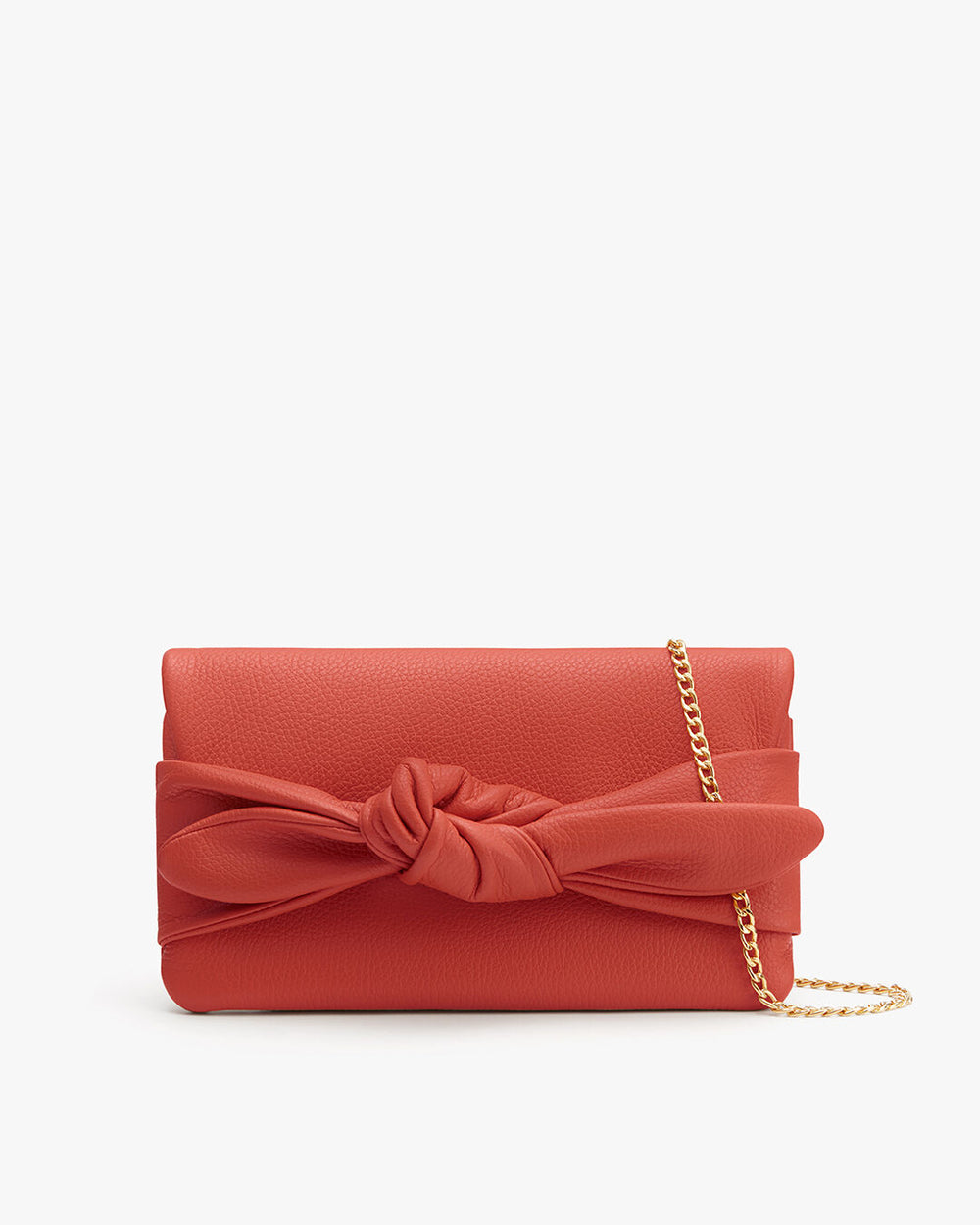Handbag with a knotted design and chain strap on a plain background.