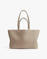 Large tote bag with two handles, standing upright.