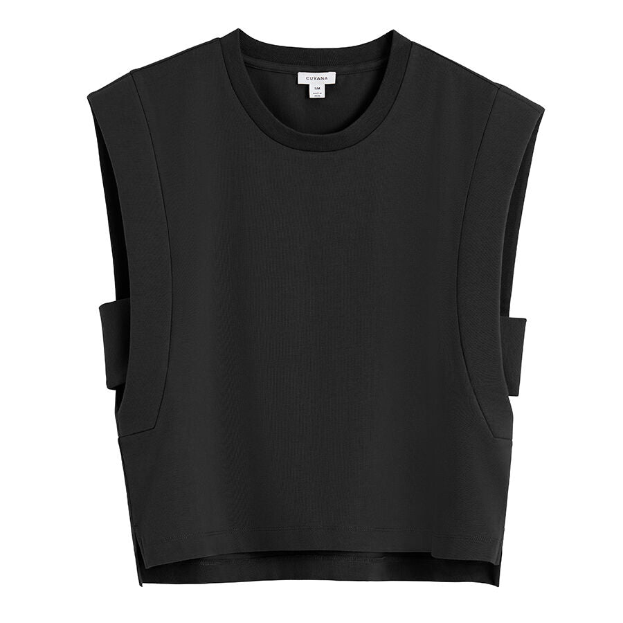 Sleeveless top with shoulder pads and side buckles.