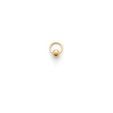 Ring with a centered sphere on a plain background.