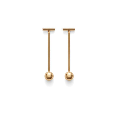 Two bar and ball drop earrings on a plain background.