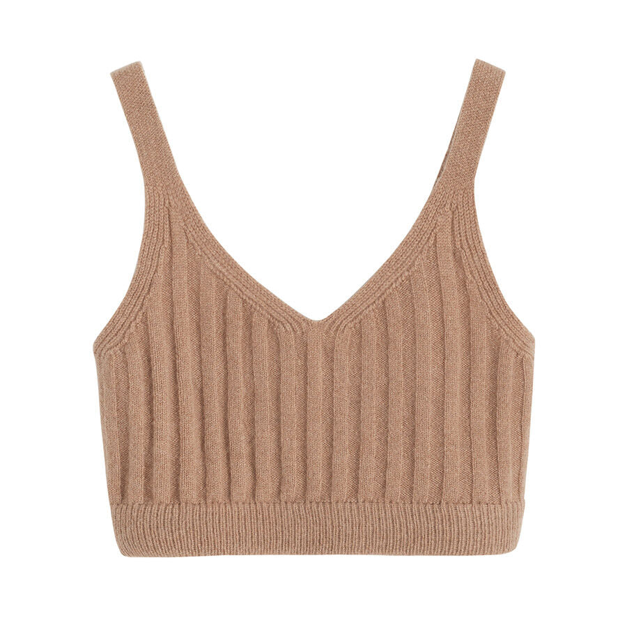 Knitted sleeveless top with V-neckline on a plain background.