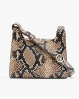 Patterned handbag with a shoulder strap and front clasp.