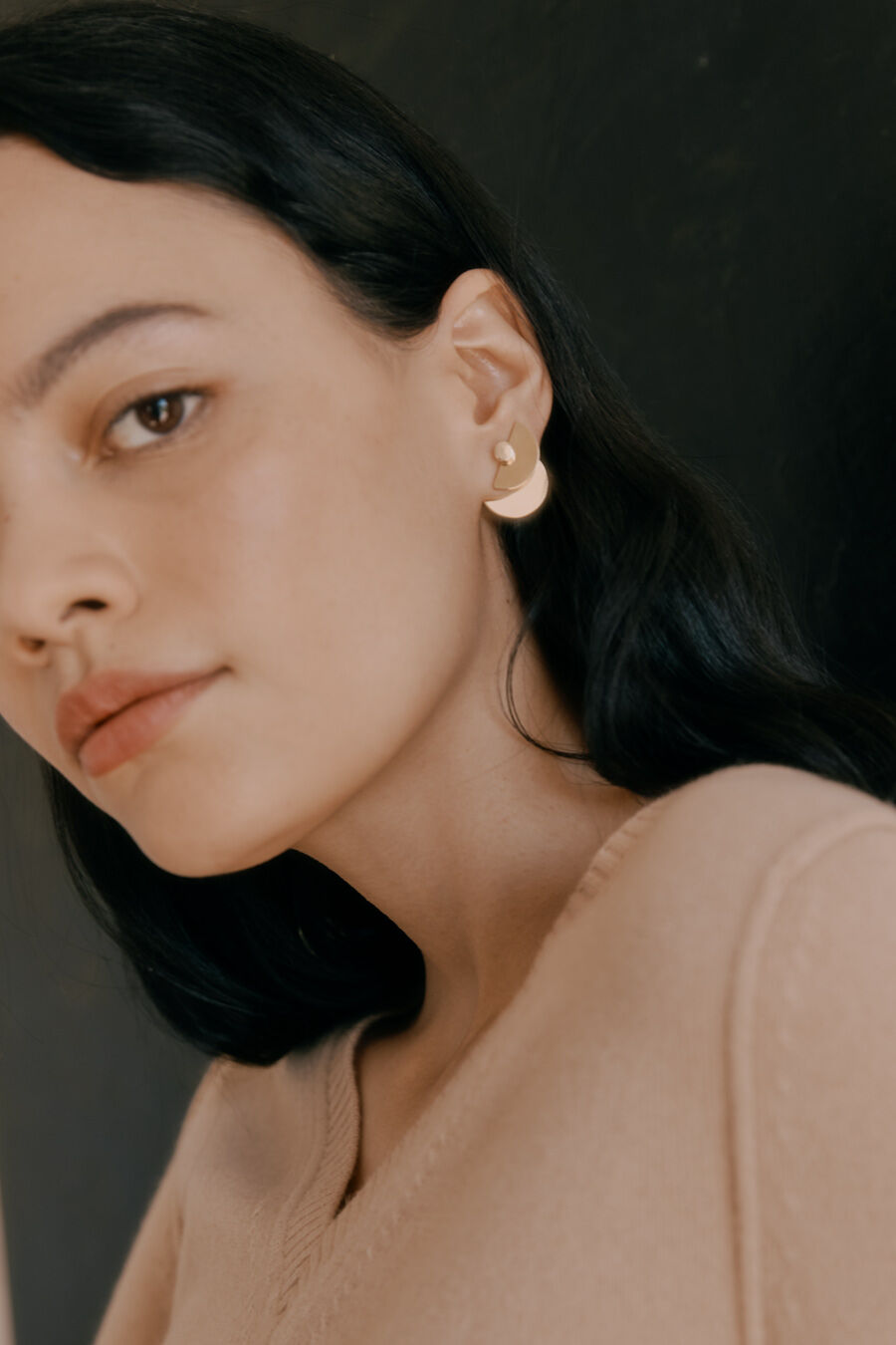 Close-up of a woman wearing an earring