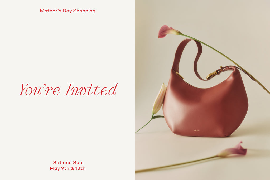 Invitation card with a handbag and flowers.