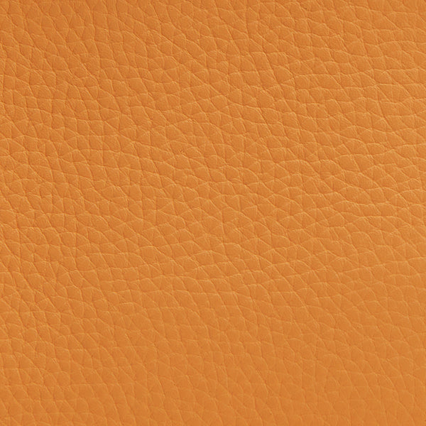 Close-up texture of leather fabric with fine grain detail.