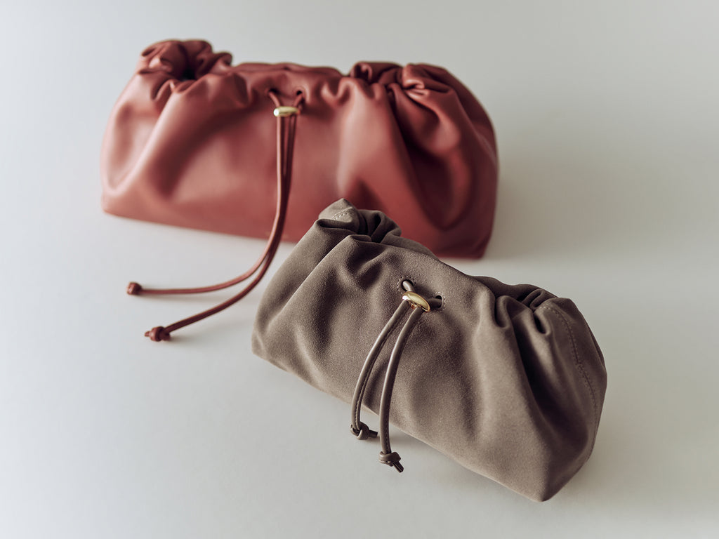 Two drawstring pouches placed side by side.