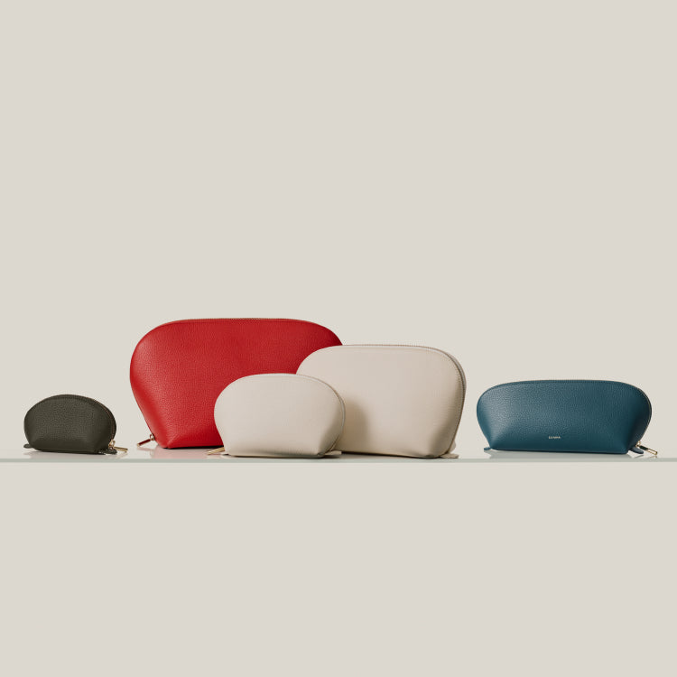 Five pouches of varying sizes arranged in a row.