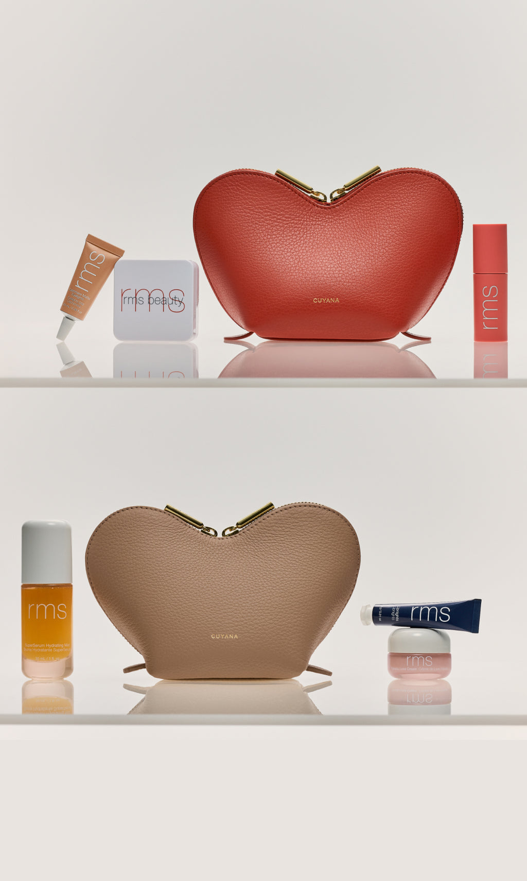 Two heart-shaped bags with makeup items on display.