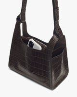 Shoulder bag with croc-embossed leather and phone in outside pocket