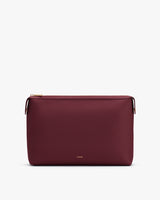 Rectangular leather clutch bag with a zipper on top.