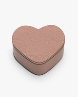 Heart-shaped textured jewelry box with lid closed.