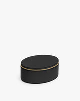 Oval leather storage box with zip closure