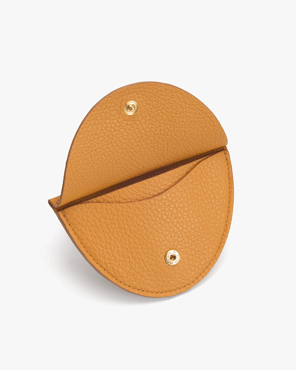 Round leather wallet with snap closures on a white background.