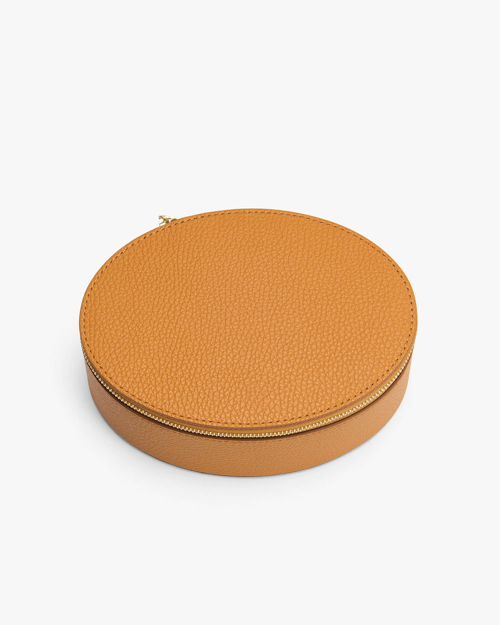 Round zippered leather case on a white background.