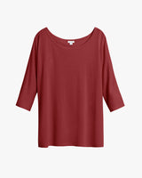 Long-sleeve shirt with a wide neckline.