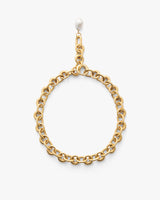 Gold chain necklace with a hanging pearl charm.