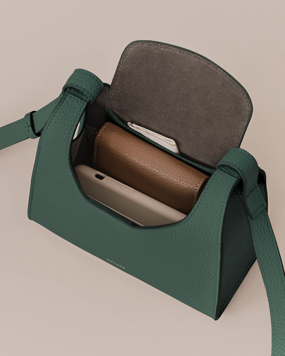 Open handbag with wallet and phone inside