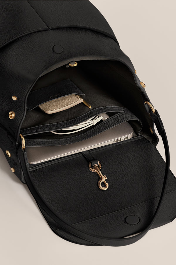 cuyana mini leather backpack 16-inch This bag offers carrying comfort with adjustable leather shoulder straps and a top grab handle Leather Backpacks Cuyana