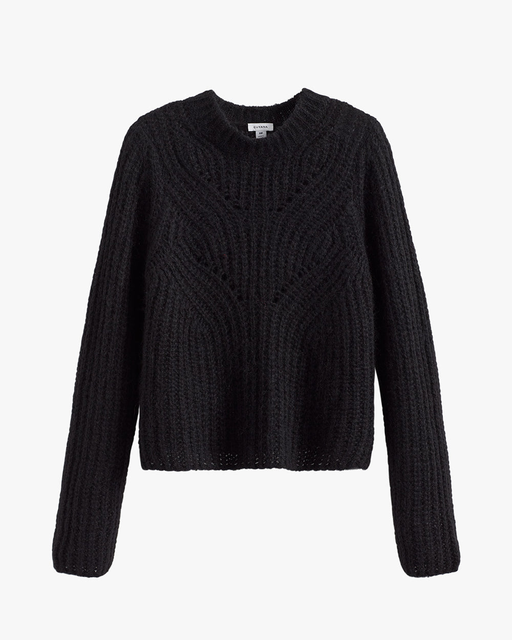 Knitted sweater with long sleeves and cable patterns on a plain background.