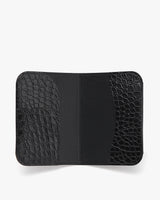 Wallet with textured and smooth sections