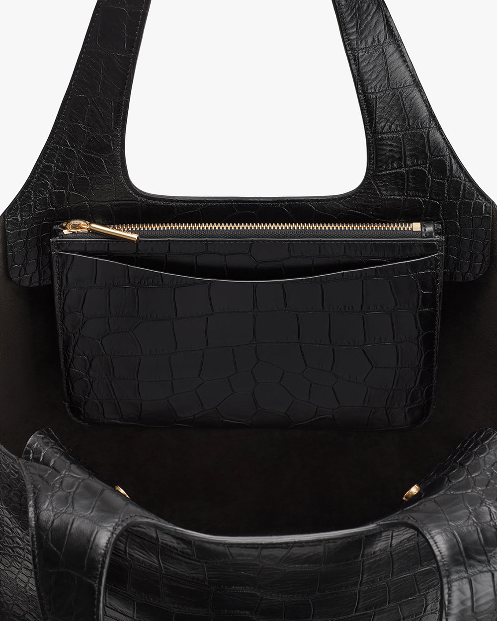Handbag with a smaller pouch attached by a zipper.