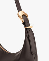 Shoulder bag with metal buckle detail on the strap