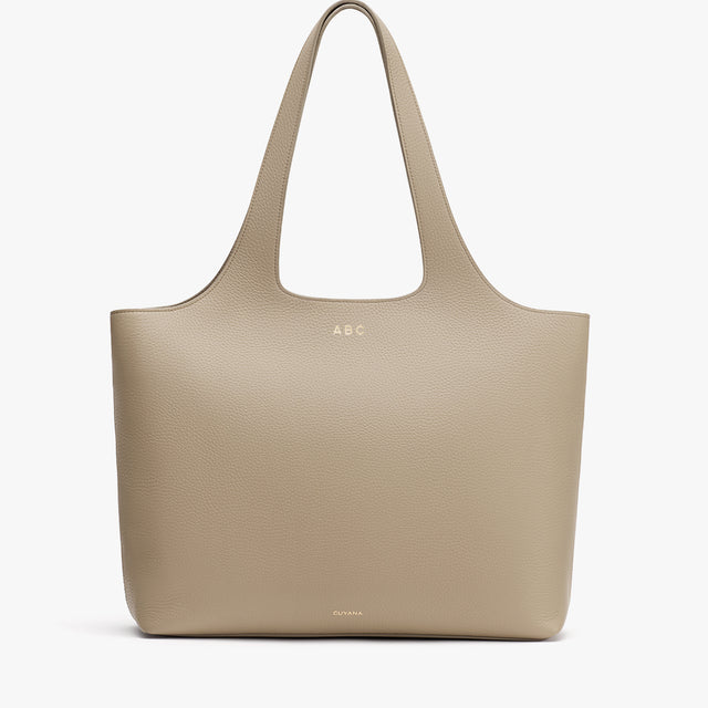 Large tote bag with two handles.