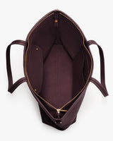 Open tote bag with handles and zippered top.