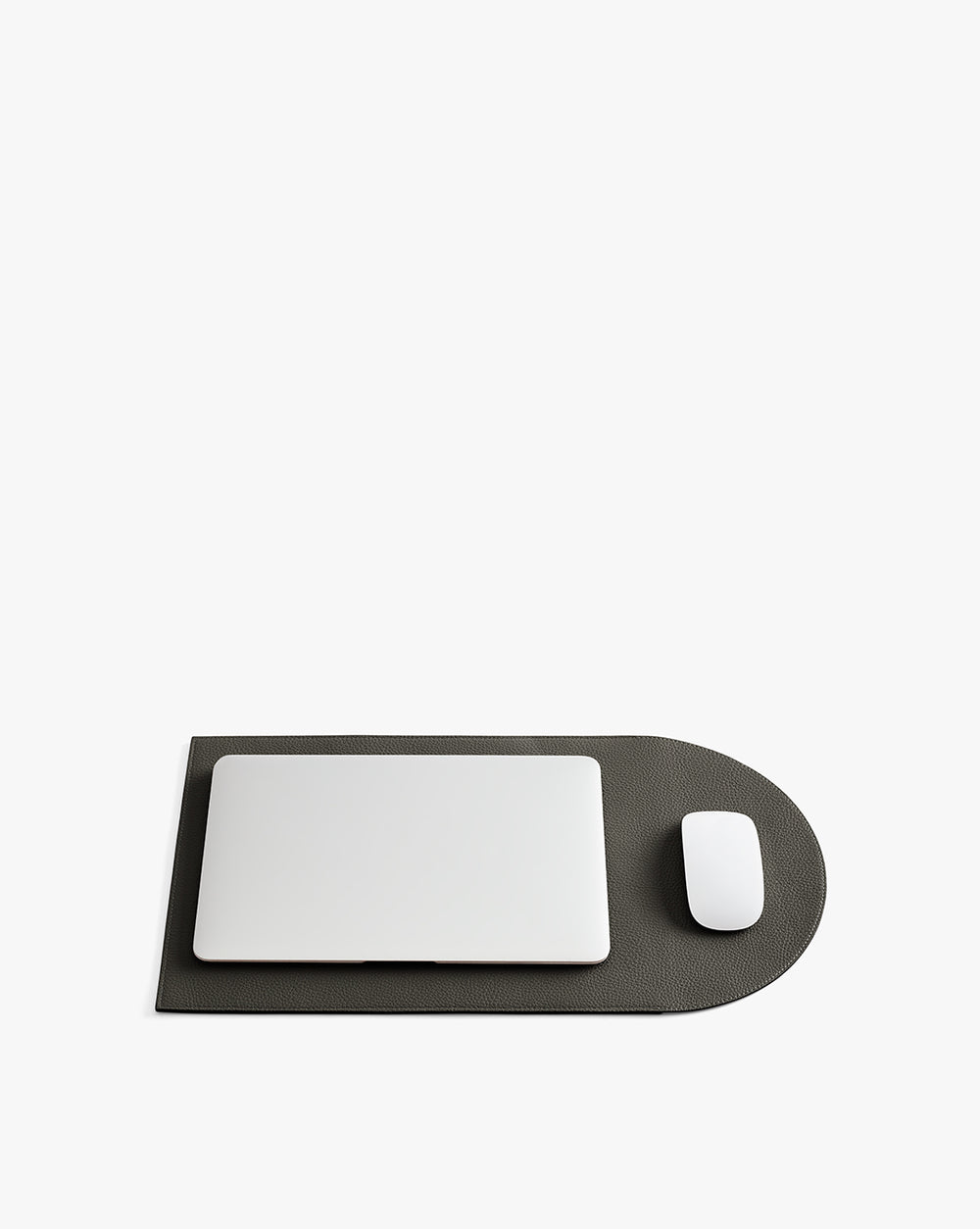 Laptop and mouse on a flattened laptop sleeve.