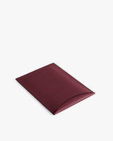 Rectangular leather document holder with visible flap opening.