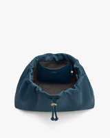 Open bag showing interior pocket with logo.