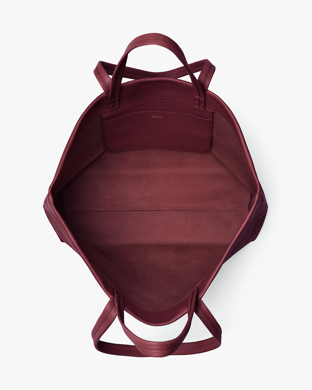 Open tote bag with handles and an interior pocket.