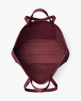 Open tote bag with handles and an interior pocket.