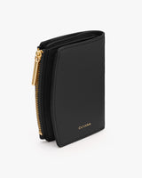 Small wallet with a zippered pocket and visible branding.