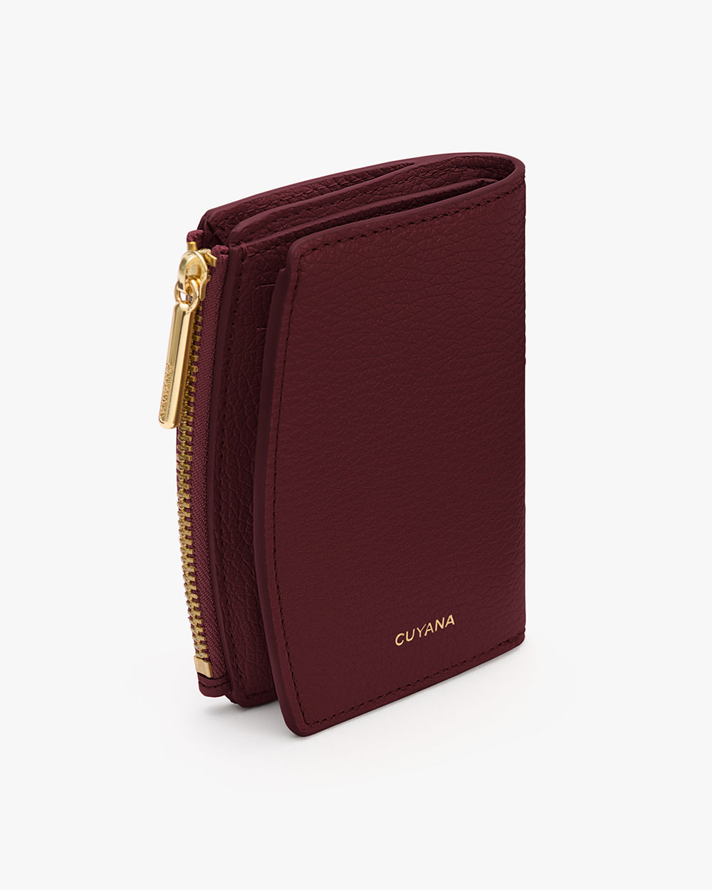 Compact wallet with zippered section and visible brand logo.