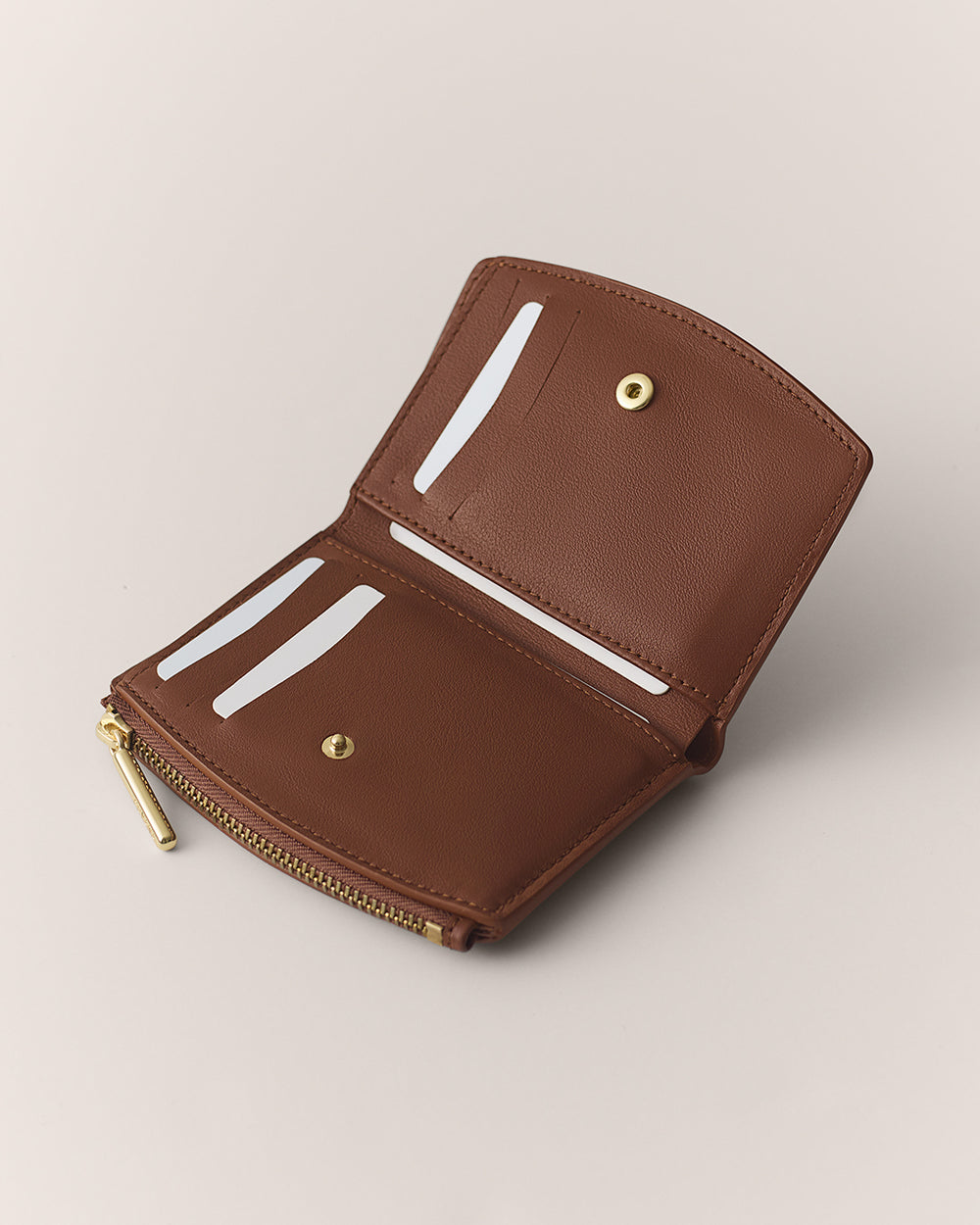 Open wallet with card slots and zipper pouch