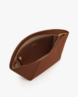 Open pouch with zipper and small inner pocket.