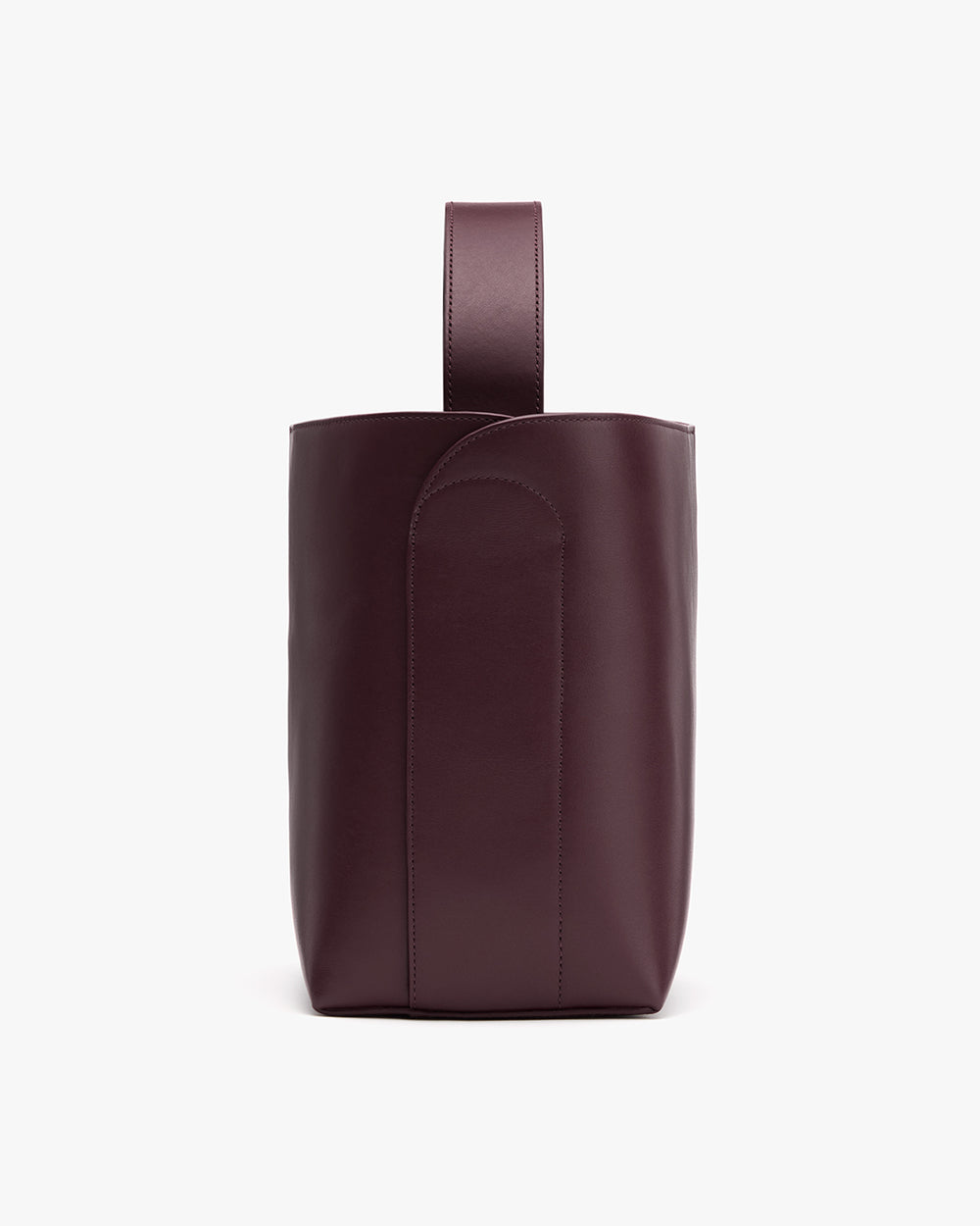 Tall leather bag with a single handle on top.