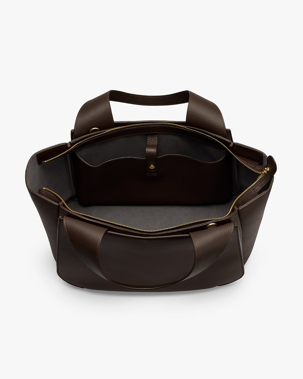 Open tote bag with handles and visible pocket inside