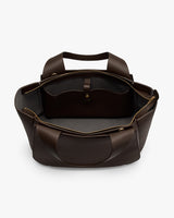 Open tote bag with handles and visible pocket inside