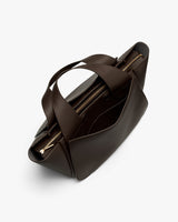 Top view of an open tote bag with handles and multiple compartments.