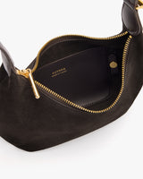 Open purse with visible interior and zippered pocket.