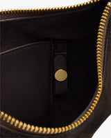 Open bag showing zipper, internal pocket, and a button.