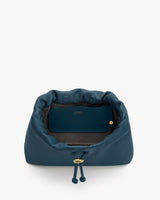 Open bag with visible small pocket inside.