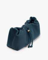 Soft drawstring handbag with a gathered top design.