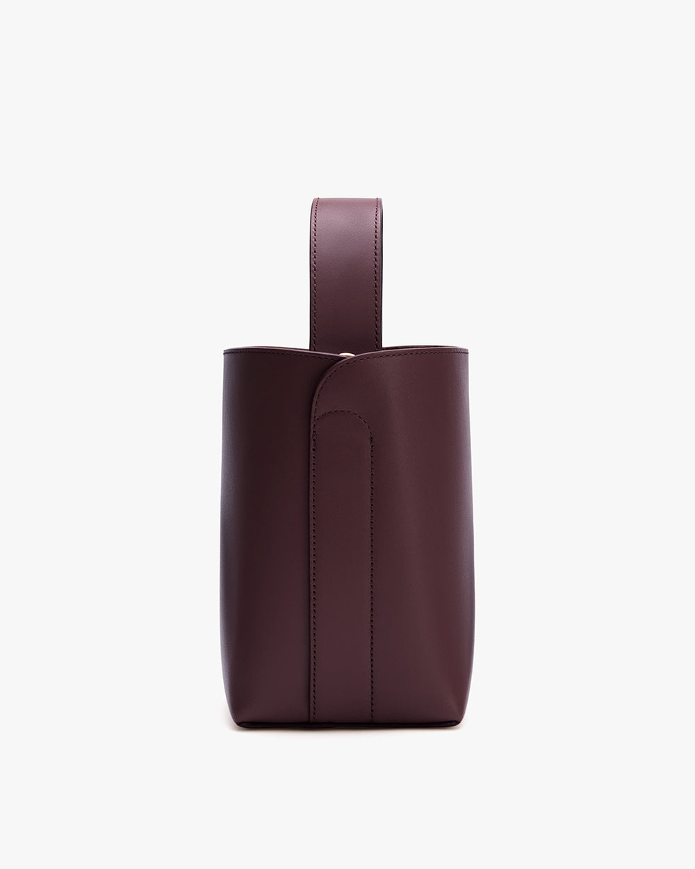 Sleek leather bucket bag with a single handle viewed from the side.