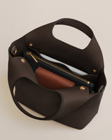 Open handbag with a wallet and zippered pouch inside